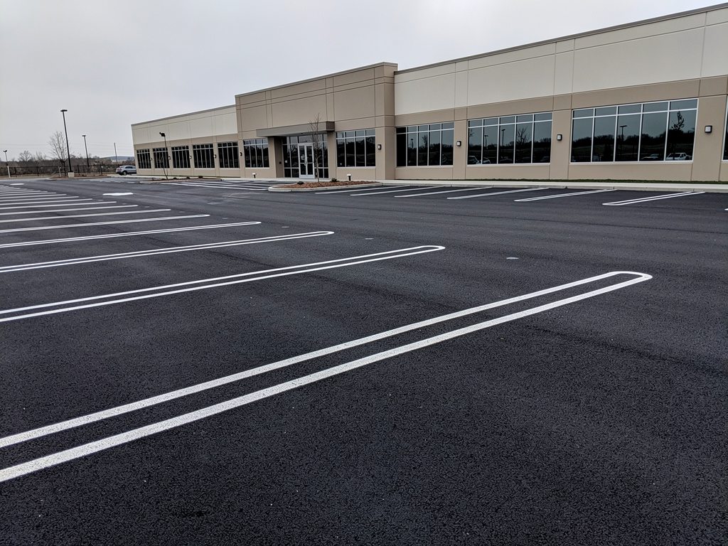 Freshly paved and striped commercial asphalt parking lot near McLean, VA